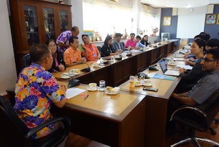 Stakeholders meeting up at a roundtable